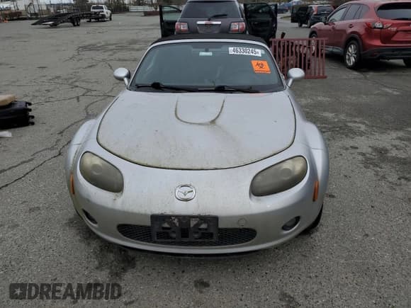 ✅ 2006 Mazda MX-5 Miata Touring • VIN: JM1NC25F560102313 • Лот: 46330245. Опубликован ранее на Copart с пробегом Не указан. Бесплатный доступ к архиву аукционных продаж из США и подробный отчёт об истории автомобиля на DreamBid. Изображение 5.