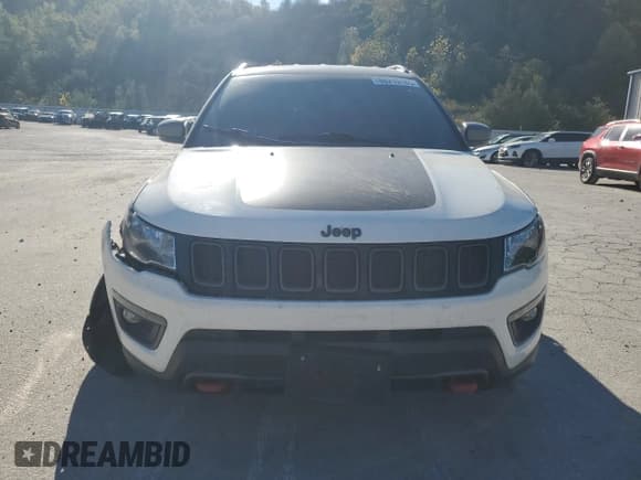 ✅ 2021 Jeep Compass Trailhawk • VIN: 3C4NJDDBXMT590531 • Lot: 86219185. Listed on Copart with 58,645 mi. Free auction sales archive from the USA and detailed vehicle history report at DreamBid. Image 5.