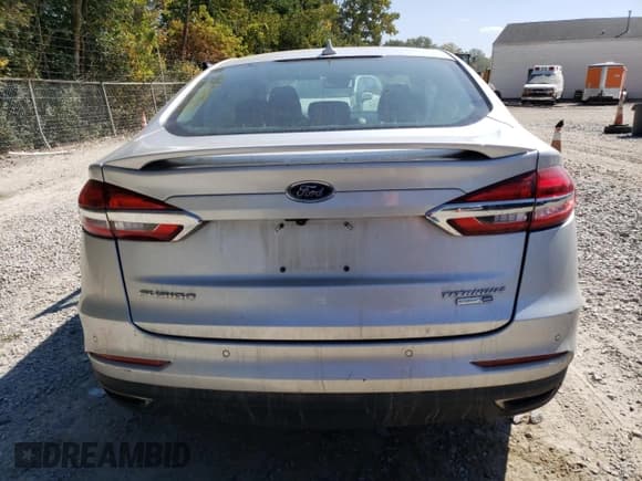 ✅ 2019 Ford Fusion Titanium • VIN: 3FA6P0D99KR186824 • Lot: 80828675. Wystawiony na Copart z przebiegiem 160 347 mil. Bezpłatny archiwum sprzedaży aukcyjnych z USA i szczegółowy raport historii pojazdu na DreamBid. Zdjęcie 6.