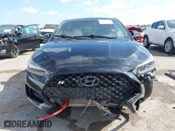 2020 Hyundai Veloster z VIN KMHT36AH9LU007422, wystawiony jako IAAI lot #42513370 z przebiegiem 102 805 mil mil oraz . Historia ofert i sprzedaży dostępna na DreamBid. Obrazek 12.