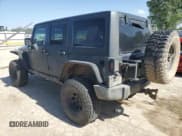 ✅ 2008 Jeep Wrangler Unlimited Rubicon • VIN: 1J8GA69198L550682 • Lot: 57333575. Listed on Copart with 176,224 mi. Free auction sales archive from the USA and detailed vehicle history report at DreamBid. Image 2.