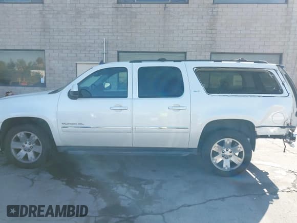✅ 2013 GMC Yukon XL SLT • VIN: 1GKS2KE79DR239380 • Lot: 42655229. Listed on IAAI with 213,728 mi. Free auction sales archive from the USA and detailed vehicle history report at DreamBid. Image 15.