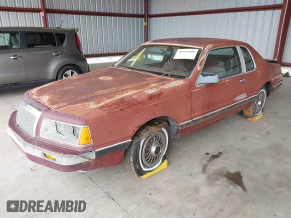 ✅ 1984 Ford Thunderbird • VIN: 1FABP4630EA111572 • Lot: 41569309. Listed on IAAI with 7,919 mi. Free auction sales archive from the USA and detailed vehicle history report at DreamBid. Image 2.