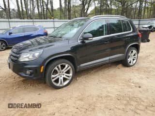✅ 2012 Volkswagen Tiguan LE • VIN: WVGAV7AX9CW555942 • Lot: 51303575. Listed on Copart with 130,491 mi. Free auction sales archive from the USA and detailed vehicle history report at DreamBid. Image 1.