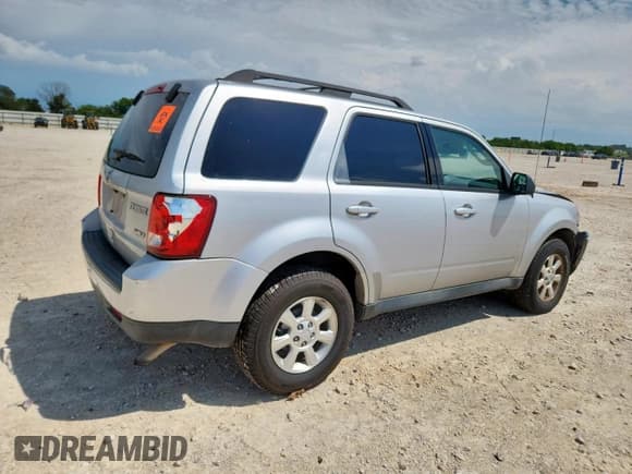 ✅ 2011 Mazda Tribute Grand Touring • VIN: 4F2CY9GG3BKM07203 • Lot: 62137295. Listed on Copart with 205,836 mi. Free auction sales archive from the USA and detailed vehicle history report at DreamBid. Image 3.