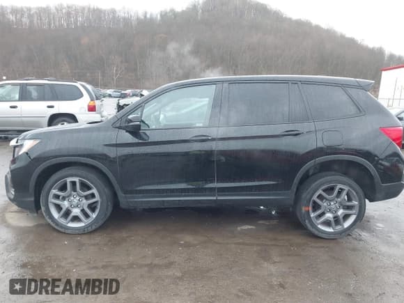 ✅ 2023 Honda Passport EX-L • VIN: 5FNYF8H56PB024816 • Лот: 41785311. Опубликован ранее на IAAI с пробегом 31 604 миль. Бесплатный доступ к архиву аукционных продаж из США и подробный отчёт об истории автомобиля на DreamBid. Изображение 15.