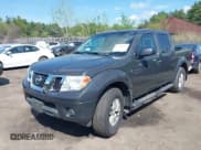 ✅ 2014 Nissan Frontier SV • VIN: 1N6AD0EV9EN749996 • Lot: 42262048. Listed on IAAI with 148,140 mi. Free auction sales archive from the USA and detailed vehicle history report at DreamBid. Image 2.