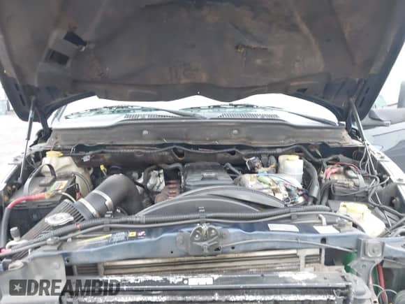 2005 Dodge 3500 SLT z VIN 3D7LS38C35G814451, wystawiony jako IAAI lot #41188892 z przebiegiem 247 468 mil mil oraz . Historia ofert i sprzedaży dostępna na DreamBid. Obrazek 10.