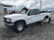 ✅ 1996 Mazda B-Series • VIN: 4F4CR17X6TTM26619 • Lot: 68478145. Listed on Copart with 156,595 mi. Free auction sales archive from the USA and detailed vehicle history report at DreamBid. Image 1.