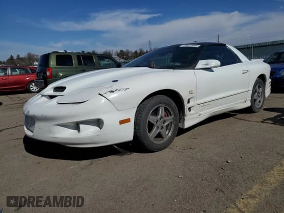 ✅ 1999 Pontiac Firebird Firebird • VIN: 2G2FS22K9X2220880 • Lot: 46225985. Listed on Copart with 167,696 mi. Free auction sales archive from the USA and detailed vehicle history report at DreamBid. Image 1.