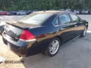 ✅ 2014 Chevrolet Impala LTZ • VIN: 2G1WC5E34E1121782 • Lot: 42543786. Listed on IAAI with 111,767 mi. Free auction sales archive from the USA and detailed vehicle history report at DreamBid. Image 4.