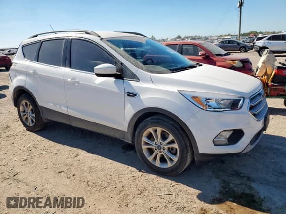 ✅ 2018 Ford Escape SE • VIN: 1FMCU9GD0JUC78448 • Lot: 85408185. Wystawiony na Copart z przebiegiem 55 779 mil. Bezpłatny archiwum sprzedaży aukcyjnych z USA i szczegółowy raport historii pojazdu na DreamBid. Zdjęcie 4.