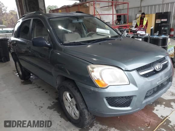 ✅ 2009 Kia Sportage EX • VIN: KNDJF723397563597 • Лот: 43800554. Опубликован ранее на IAAI с пробегом 196 423 миль. Бесплатный доступ к архиву аукционных продаж из США и подробный отчёт об истории автомобиля на DreamBid. Изображение 1.