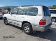 ✅ 2001 Toyota Land Cruiser • VIN: JTEHT05J412011211 • Lot: 41978366. Listed on IAAI with 183,684 mi. Free auction sales archive from the USA and detailed vehicle history report at DreamBid. Image 3.