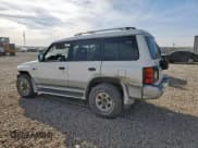 ✅ 1998 Mitsubishi Montero • VIN: JA4MR51R6WJ002639 • Lot: 82756475. Wystawiony na Copart z przebiegiem 234 948 mil. Bezpłatny archiwum sprzedaży aukcyjnych z USA i szczegółowy raport historii pojazdu na DreamBid. Zdjęcie 2.