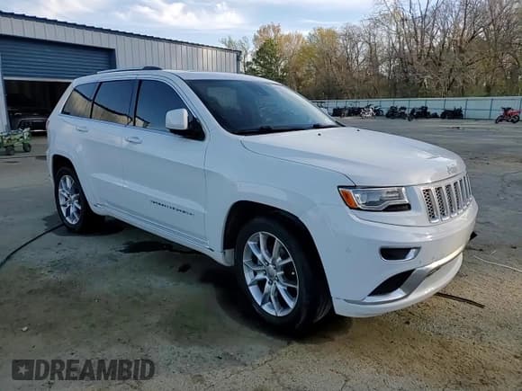 ✅ 2015 Jeep Grand Cherokee Summit • VIN: 1C4RJEJG0FC118974 • Lot: 49002165. Listed on Copart with 112,463 mi. Free auction sales archive from the USA and detailed vehicle history report at DreamBid. Image 14.