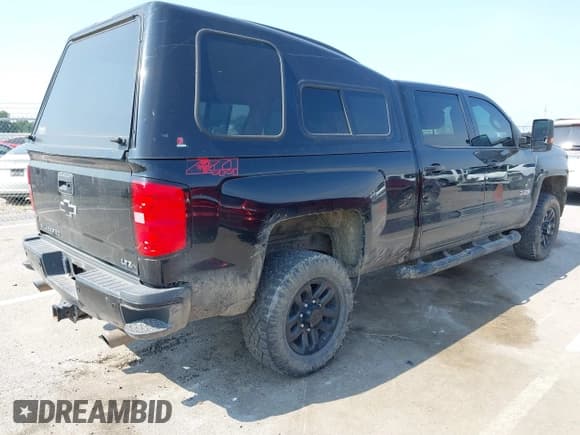✅ 2019 Chevrolet Silverado 2500HD LT • VIN: 1GC1KSEG0KF198997 • Lot: 42929829. Listed on IAAI with 40,917 mi. Free auction sales archive from the USA and detailed vehicle history report at DreamBid. Image 4.