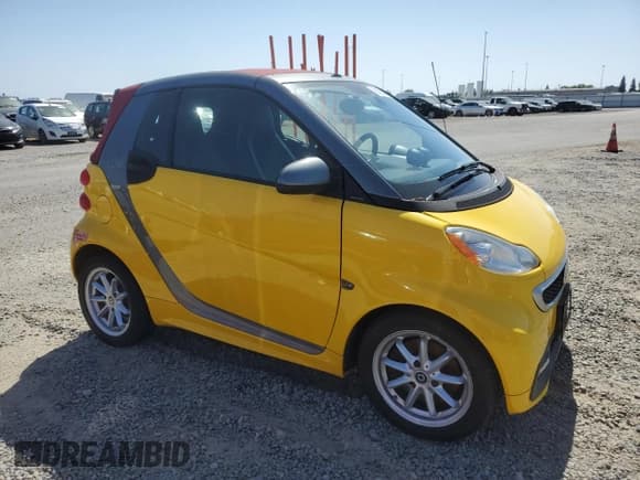 ✅ 2015 Smart fortwo • VIN: WMEEK9AA3FK828490 • Lot: 56055865. Listed on Copart with Not provided. Free auction sales archive from the USA and detailed vehicle history report at DreamBid. Image 4.
