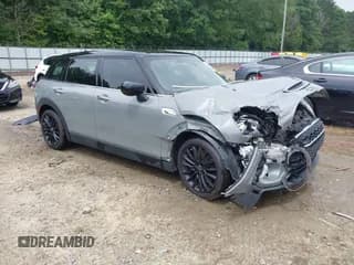 ✅ 2020 MINI Clubman Cooper S • VIN: WMWLV7C09L2L63261 • Lot: 42440616. Listed on IAAI with 90,033 mi. Free auction sales archive from the USA and detailed vehicle history report at DreamBid. Image 1.