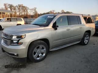 ✅ 2015 Chevrolet Suburban LTZ • VIN: 1GNSKKKC2FR127429 • Lot: 77173054. Wystawiony na Copart z przebiegiem 134 288 mil. Bezpłatny archiwum sprzedaży aukcyjnych z USA i szczegółowy raport historii pojazdu na DreamBid. Zdjęcie 1.