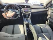 ✅ 2021 Honda Civic LX • VIN: 2HGFC2F6XMH520752 • Lot: 90006115. Listed on Copart with 77,412 mi. Free auction sales archive from the USA and detailed vehicle history report at DreamBid. Image 8.