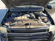 ✅ 2002 Ford Excursion Limited • VIN: 1FMNU42F02EA53673 • Lot: 76614004. Listed on Copart with 260,573 mi. Free auction sales archive from the USA and detailed vehicle history report at DreamBid. Image 12.