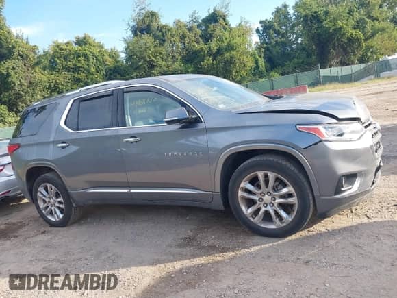 2020 Chevrolet Traverse High Country with VIN 1GNEVNKW4LJ154397, listed as a IAAI auction lot 43080136 with 68,754 mi miles and . Bid and sale history available at DreamBid. Image 13.