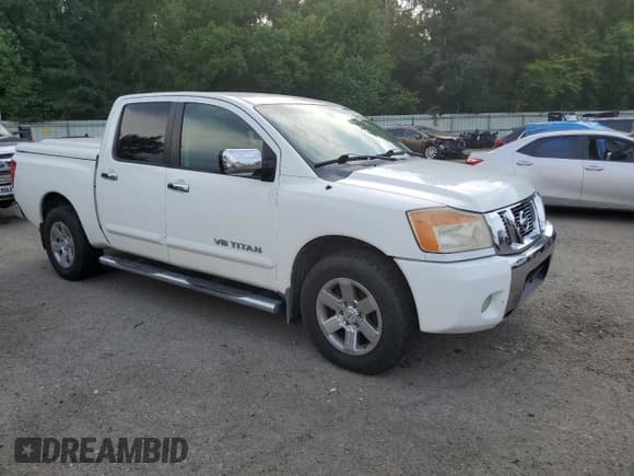 ✅ 2011 Nissan Titan SV • VIN: 1N6BA0ED4BN318885 • Lot: 69995085. Listed on Copart with 215,322 mi. Free auction sales archive from the USA and detailed vehicle history report at DreamBid. Image 4.