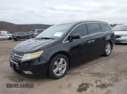 ✅ 2011 Honda Odyssey Touring • VIN: 5FNRL5H90BB014208 • Lot: 43682256. Listed on IAAI with 169,536 mi. Free auction sales archive from the USA and detailed vehicle history report at DreamBid. Image 2.