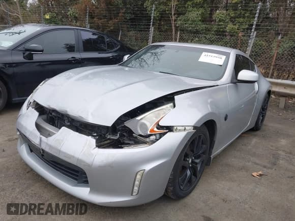 ✅ 2016 Nissan 370Z • VIN: JN1AZ4EH9GM932543 • Lot: 41515950. Listed on IAAI with 103,188 mi. Free auction sales archive from the USA and detailed vehicle history report at DreamBid. Image 2.