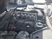 ✅ 2000 Jaguar XK • VIN: SAJJA42C5YNA02796 • Lot: 42752481. Wystawiony na IAAI z przebiegiem Nie podano. Bezpłatny archiwum sprzedaży aukcyjnych z USA i szczegółowy raport historii pojazdu na DreamBid. Zdjęcie 10.