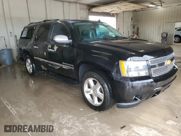 ✅ 2014 Chevrolet Suburban LTZ • VIN: 1GNSKKE76ER138866 • Lot: 89898025. Listed on Copart with 279,606 mi. Free auction sales archive from the USA and detailed vehicle history report at DreamBid. Image 4.