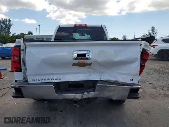 2015 Chevrolet Silverado 1500 LT with VIN 1GCRCREC8FZ362782, listed as a Copart auction lot 69407325 with 34,390 mi miles and Salvage title. Bid and sale history available at DreamBid. Image 6.