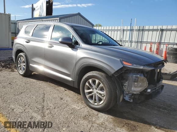 ✅ 2019 Hyundai Santa Fe SE • VIN: 5NMS23AD6KH103044 • Lot: 71320553. Wystawiony na Copart z przebiegiem 59 516 mil. Bezpłatny archiwum sprzedaży aukcyjnych z USA i szczegółowy raport historii pojazdu na DreamBid. Zdjęcie 4.