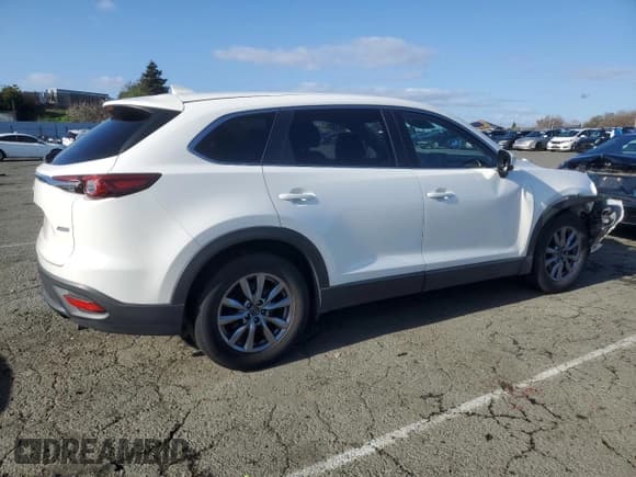 ✅ 2018 Mazda CX-9 Sport • VIN: JM3TCABY9J0221134 • Lot: 45607715. Listed on Copart with 104,204 mi. Free auction sales archive from the USA and detailed vehicle history report at DreamBid. Image 3.