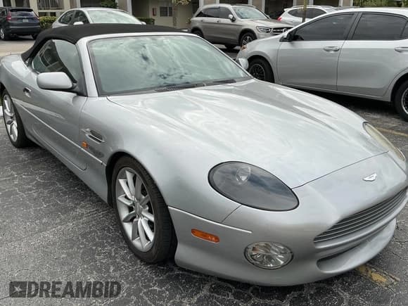 ✅ 2001 Aston Martin Vantage • VIN: SCFAB42371K401730 • Lot: 81423884. Listed on Copart with Not provided. Free auction sales archive from the USA and detailed vehicle history report at DreamBid. Image 1.