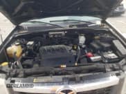 ✅ 2008 Mazda Tribute Sport • VIN: 4F2CZ06178KM05632 • Lot: 56522105. Wystawiony na Copart z przebiegiem 112 698 mil. Bezpłatny archiwum sprzedaży aukcyjnych z USA i szczegółowy raport historii pojazdu na DreamBid. Zdjęcie 12.