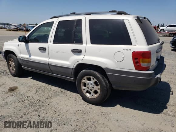 ✅ 2001 Jeep Grand Cherokee Laredo • VIN: 1J4GW48N21C505942 • Lot: 60498825. Listed on Copart with 258,115 mi. Free auction sales archive from the USA and detailed vehicle history report at DreamBid. Image 2.