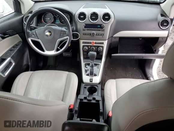 2012 Chevrolet Captiva Sport LTZ z VIN 3GNFL4E56CS615427, wystawiony jako Copart lot #79405174 z przebiegiem 112 723 mil mil oraz Szkoda całkowita • Salvage title. Historia ofert i sprzedaży dostępna na DreamBid. Obrazek 8.