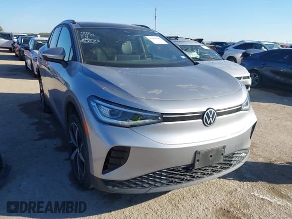 ✅ 2023 Volkswagen ID.4 S • VIN: 1V25MPE83PC030764 • Lot: 43486585. Listed on IAAI with 23,653 mi. Free auction sales archive from the USA and detailed vehicle history report at DreamBid. Image 1.