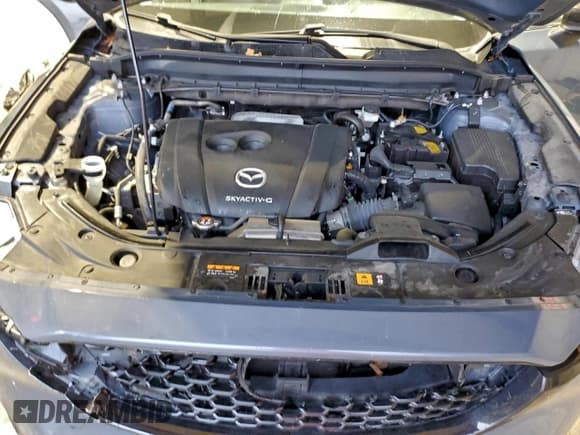 ✅ 2024 Mazda CX-5 S Carbon Edition • VIN: JM3KFBCL5R0461997 • Lot: 94061375. Listed on Copart with 50,423 mi. Free auction sales archive from the USA and detailed vehicle history report at DreamBid. Image 12.