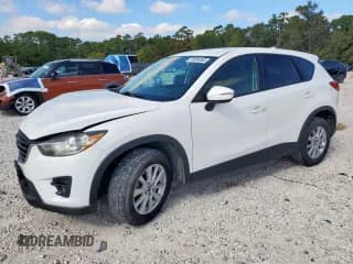 ✅ 2016 Mazda CX-5 Touring • VIN: JM3KE2CY2G0607428 • Lot: 91684385. Wystawiony na Copart z przebiegiem 130 111 mil. Bezpłatny archiwum sprzedaży aukcyjnych z USA i szczegółowy raport historii pojazdu na DreamBid. Zdjęcie 1.