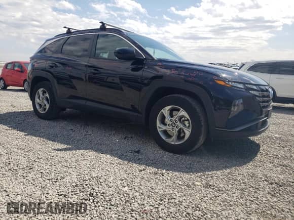 2024 Hyundai Tucson SEL with VIN 5NMJBCDE5RH385672, listed as a Copart auction lot 50835655 with 20,684 mi miles and Salvage title. Bid and sale history available at DreamBid. Image 4.