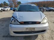 ✅ 2001 Ford Focus SE • VIN: 1FAHP36331W298095 • Lot: 94436855. Listed on Copart with 176,068 mi. Free auction sales archive from the USA and detailed vehicle history report at DreamBid. Image 5.