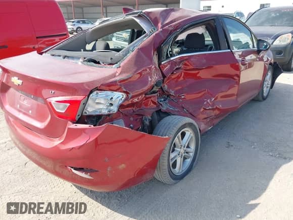 2017 Chevrolet Cruze LT with VIN 1G1BE5SM1H7234876, listed as a IAAI auction lot 43335341 with 74,838 mi miles and . Bid and sale history available at DreamBid. Image 4.