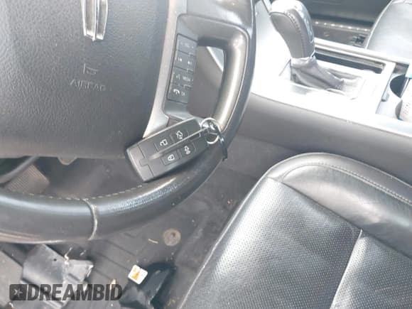 ✅ 2011 Lincoln MKS • VIN: 1LNHL9DR3BG609676 • Lot: 42823343. Listed on IAAI with 107,496 mi. Free auction sales archive from the USA and detailed vehicle history report at DreamBid. Image 11.