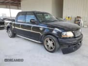 ✅ 2003 Ford F-150 Harley-Davidson • VIN: 1FTRW07343KD83293 • Lot: 55600275. Listed on Copart with 176,233 mi. Free auction sales archive from the USA and detailed vehicle history report at DreamBid. Image 4.