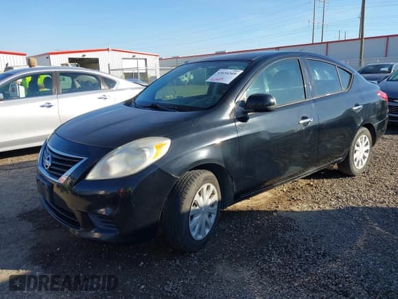 ✅ 2014 Nissan Versa SV • VIN: 3N1CN7AP2EL864659 • Lot: 43654349. Listed on IAAI with 123,798 mi. Free auction sales archive from the USA and detailed vehicle history report at DreamBid. Image 2.
