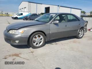 ✅ 2001 Lexus ES 300 • VIN: JT8BF28G410303237 • Лот: 81873015. Опубликован ранее на Copart с пробегом 158 016 миль. Бесплатный доступ к архиву аукционных продаж из США и подробный отчёт об истории автомобиля на DreamBid. Изображение 1.