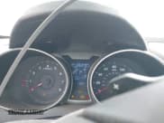 ✅ 2014 Hyundai Veloster • VIN: KMHTC6AD7EU195907 • Lot: 41548595. Wystawiony na IAAI z przebiegiem 106 349 mil. Bezpłatny archiwum sprzedaży aukcyjnych z USA i szczegółowy raport historii pojazdu na DreamBid. Zdjęcie 7.